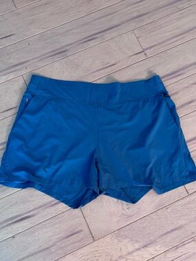 Athleta workout shorts - teal color.  Size 18, fits like an XXL.